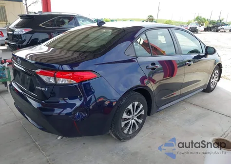 2022 Toyota Corolla Hybrid Le z USA, uszkodzony, nr VIN JTDEAMDE9NJ057685
